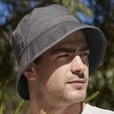 Man wearing graphite bucket hat