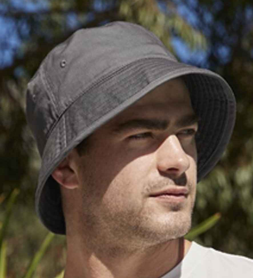 Man wearing graphite bucket hat