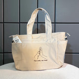 Two Souls Studio Tote Bag